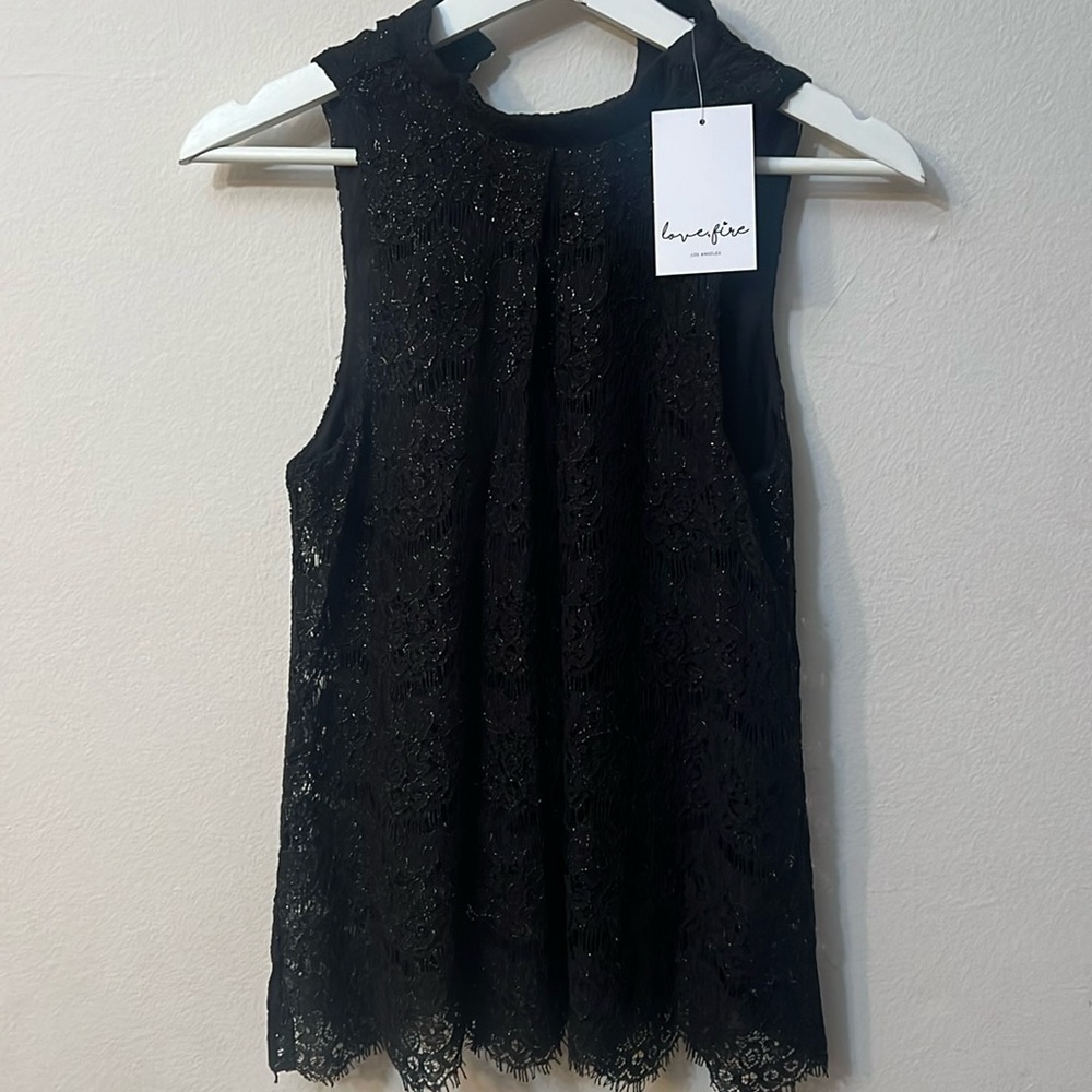 Lovefire black sleeves top size S with golden shine tread 326